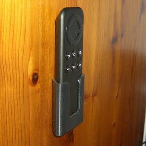 Seinään asennettava pidike Amazon FireTV Stick -kaukosäätimelle