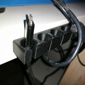 USB-kaapeliteline kaapeleiden järjestämiseen