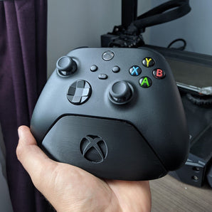 Minimalistinen Xbox-ohjainteline Xbox-logolla