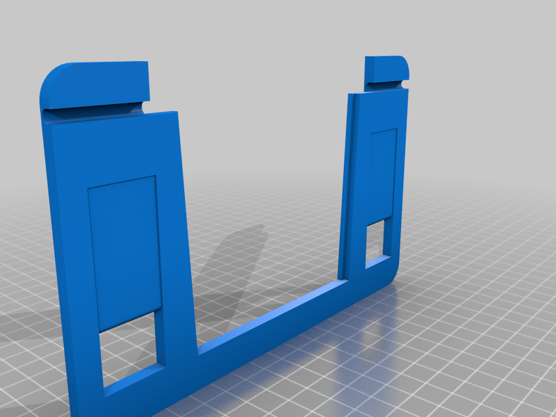 Kelluva tabletin seinäteline, jossa lataustuki