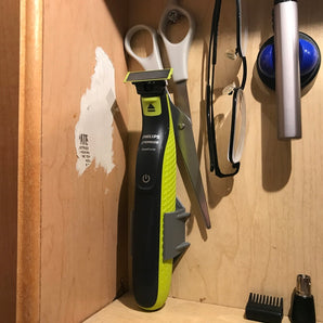 Philips OneBlade -pidike ja laturikiinnitys