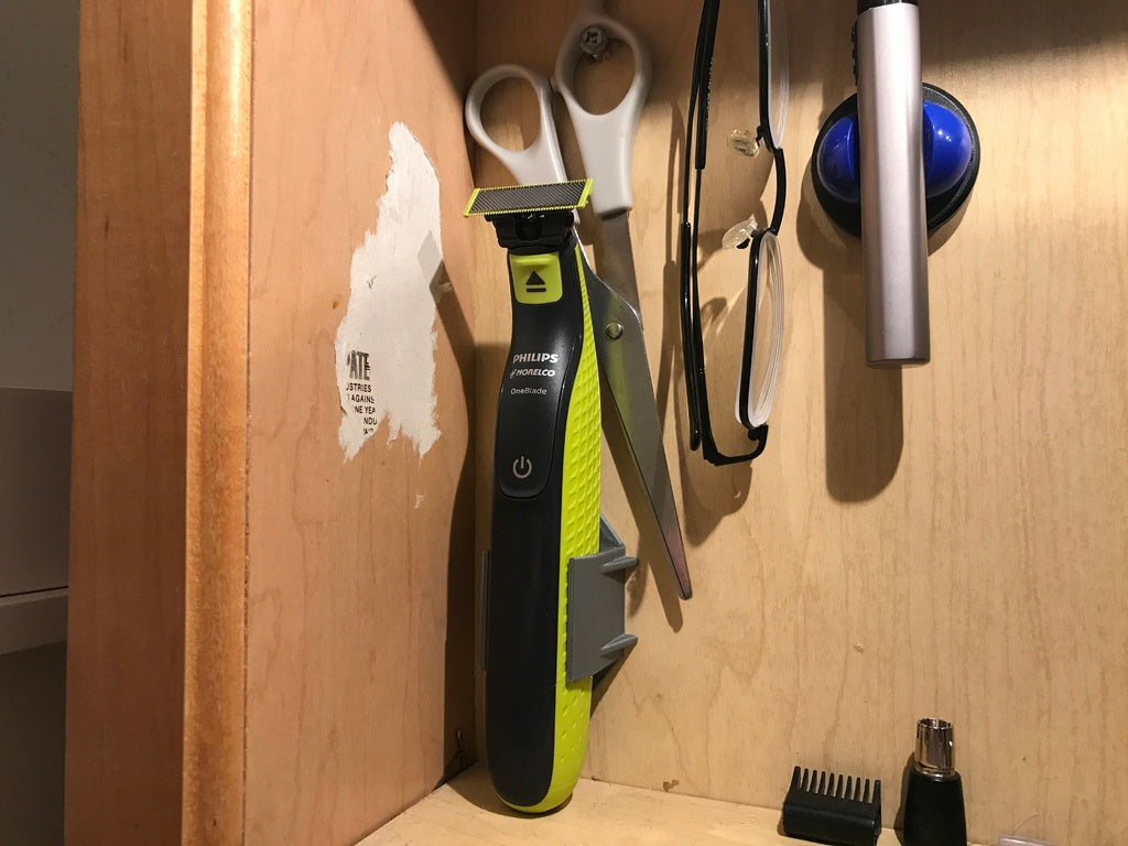 Philips OneBlade -pidike ja laturikiinnitys