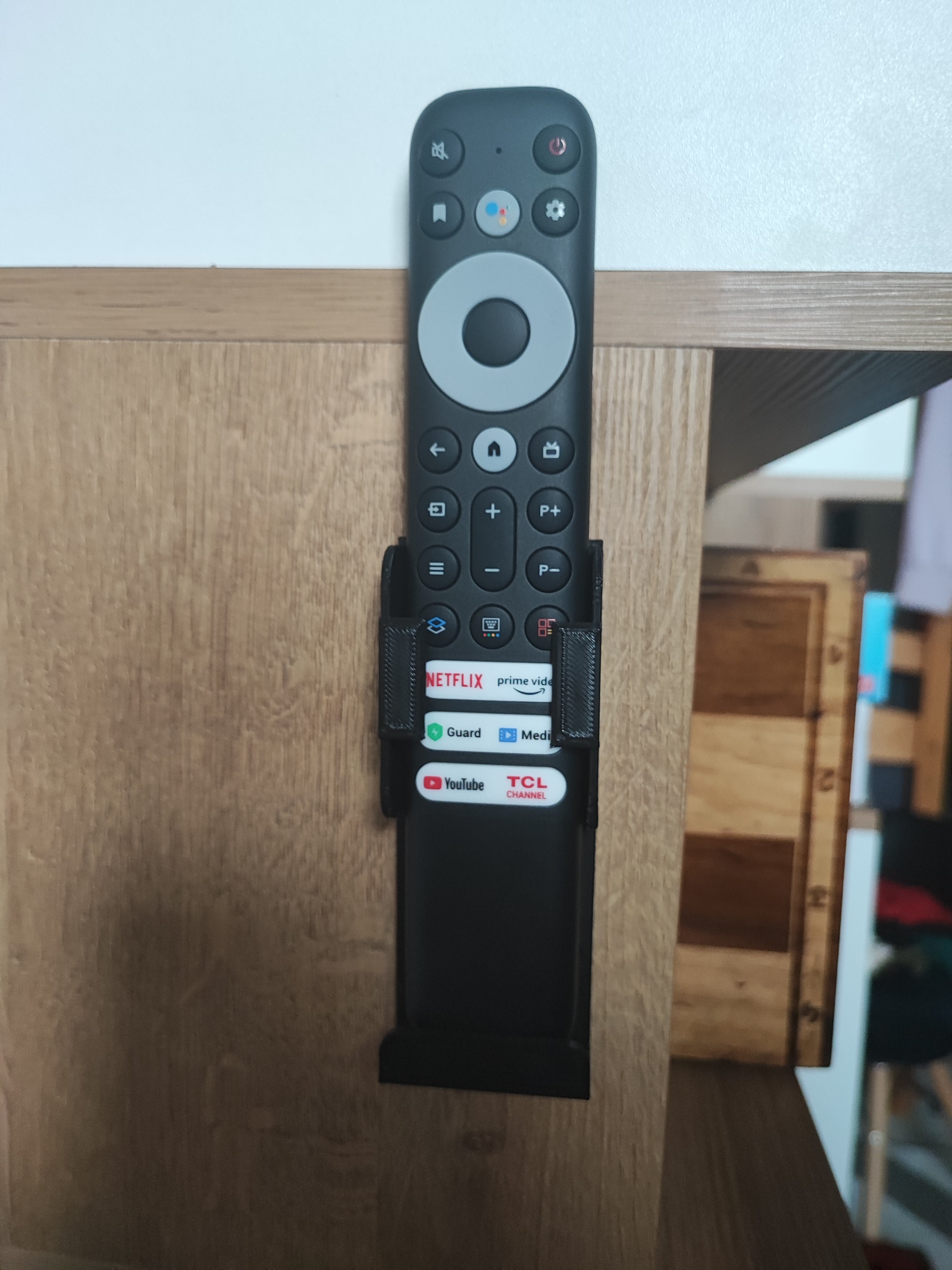 TV kaukosäätimen pidike TCL