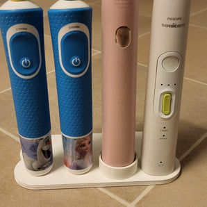 Yleiskäyttöinen hammasharjan pidike Oral-B:lle, Philips Sonicarelle ja Soocasille