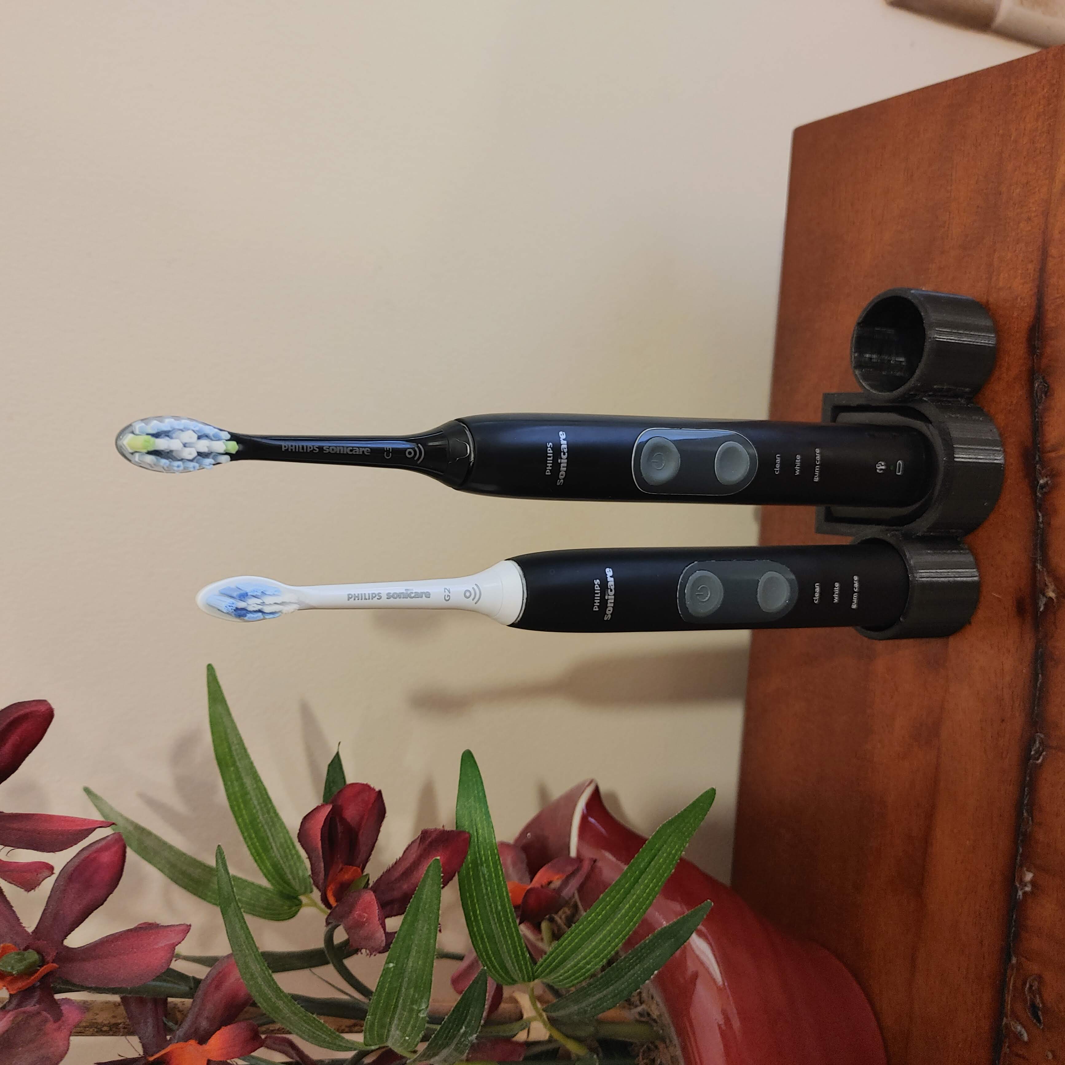 Teline kahdelle Philips Sonicare -hammasharjalle ja laturille