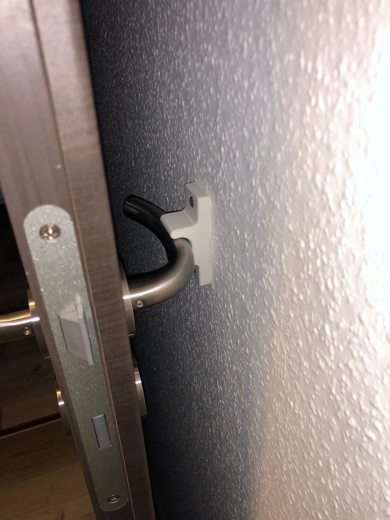 Seinään kiinnitettävä oven pysäytin eri kokoja