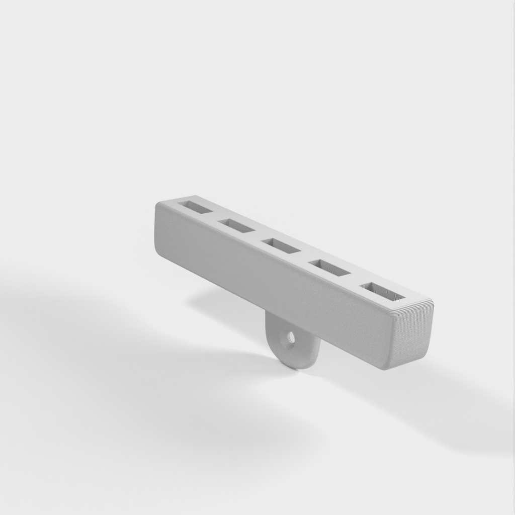 USB-kaapeleiden seinäpidike, jossa on 5 paikkaa