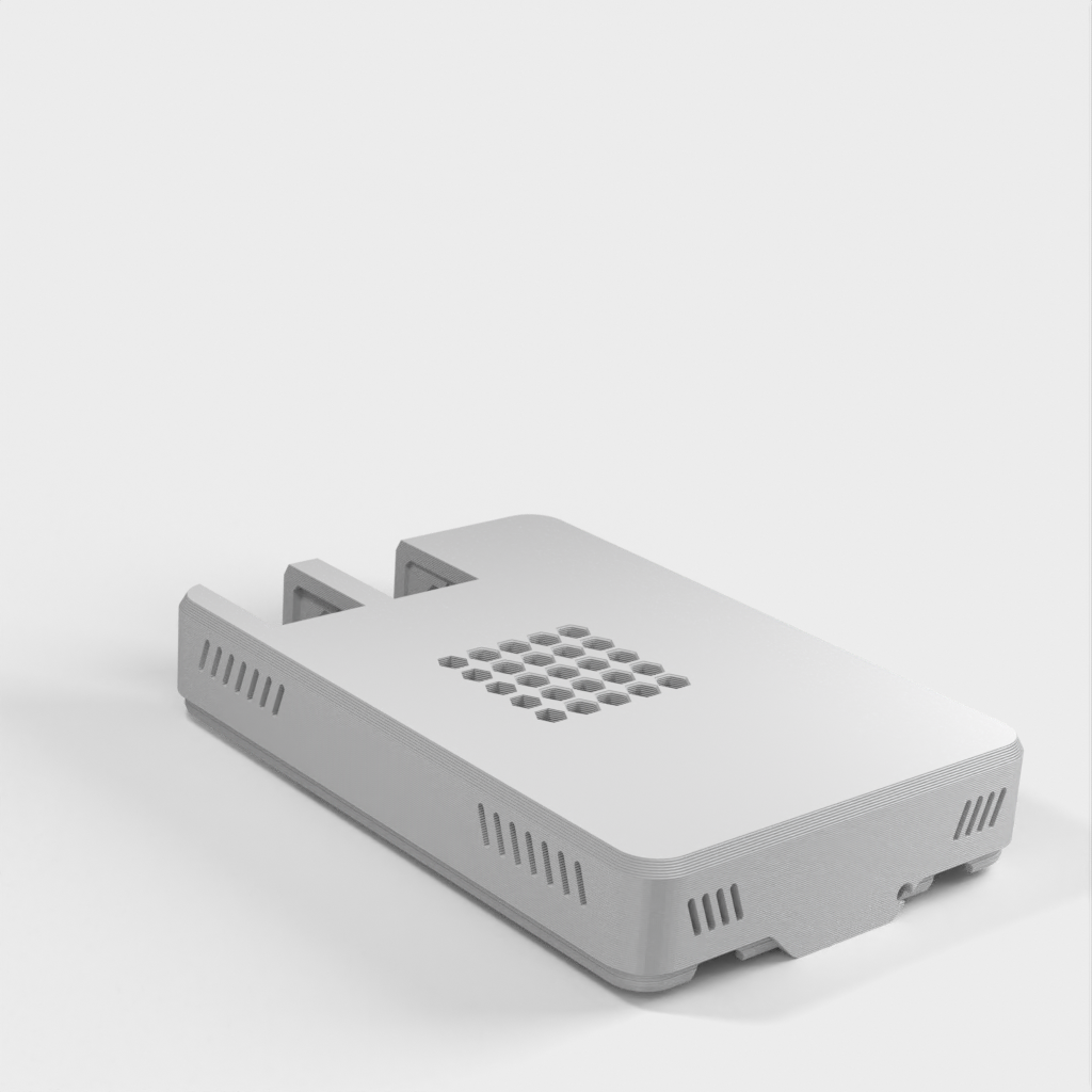 Raspberry Pi 5 -kotelo, jossa on tuuletusreikiä ja uusi USB/LAN-asettelu