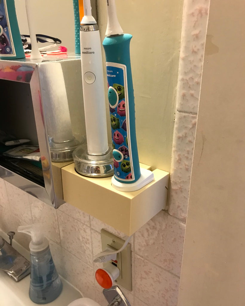 Sonicare-seinään asennettava latauskotelo hammasharjoille