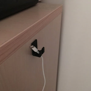 Älykäs kaapelikoukku älypuhelimen laturille