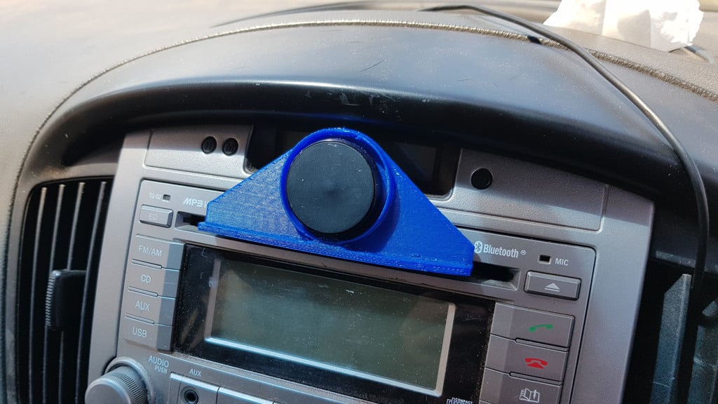 Magneettinen tabletti- ja puhelinteline auton CD-soittimelle