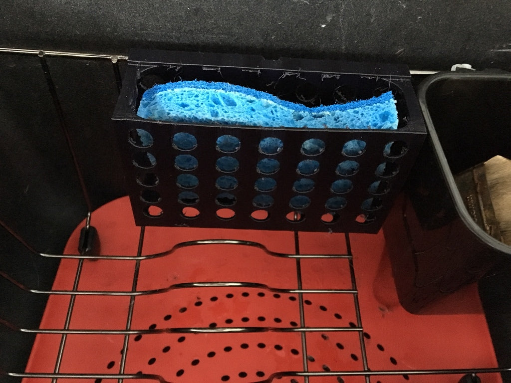 Kätevä sienipidike keittiön pesualtaaseen