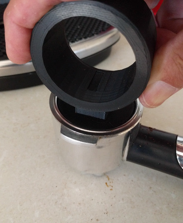Kahvisuppilo ja tampperi espressolle