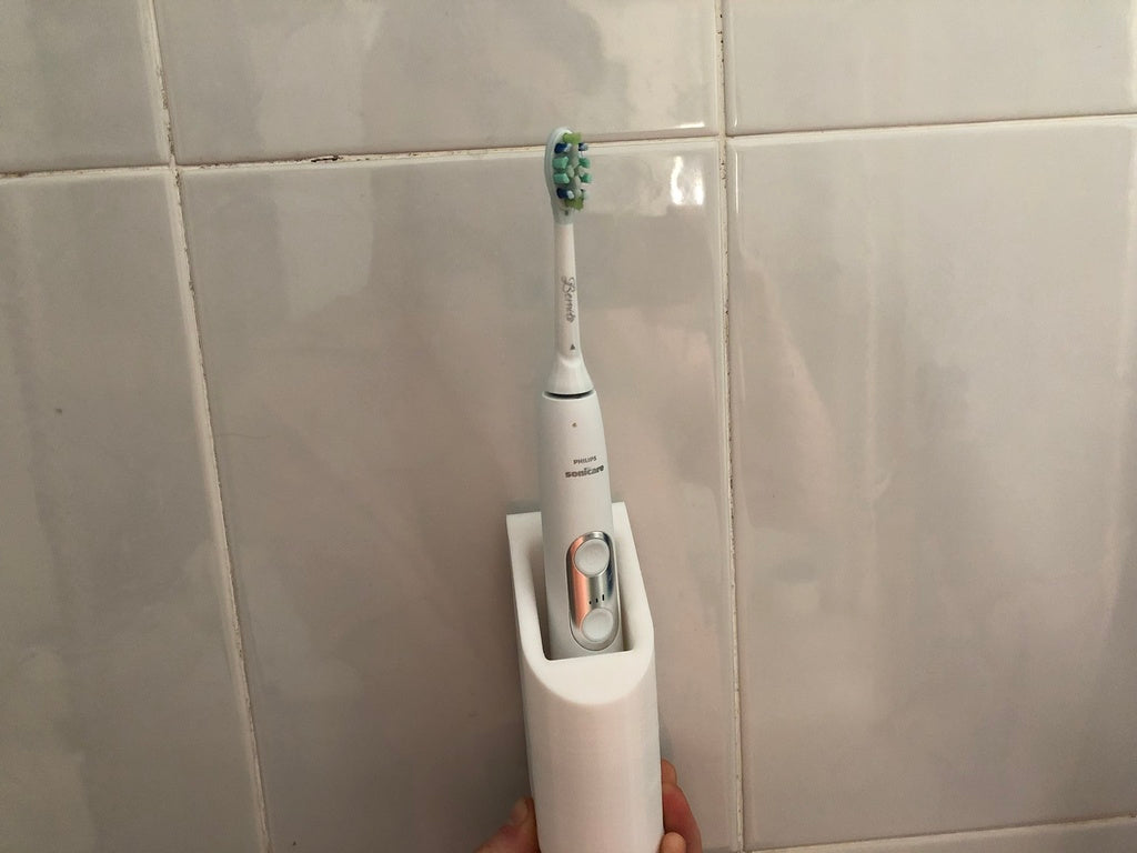 Seinään asennettava Philips Sonicare -hammasharjateline laturilla