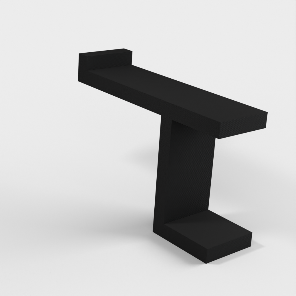 Yksinkertainen kuulokepidike Ikean &quot;LAGKAPTEN / ADILS&quot; pöytään