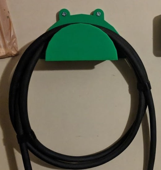 Tesla Latauskabelin Ripustin