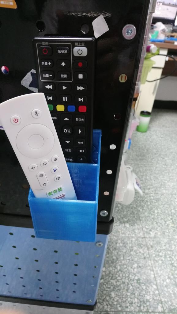 Magneettinen TV:n kaukosäätimen pidike