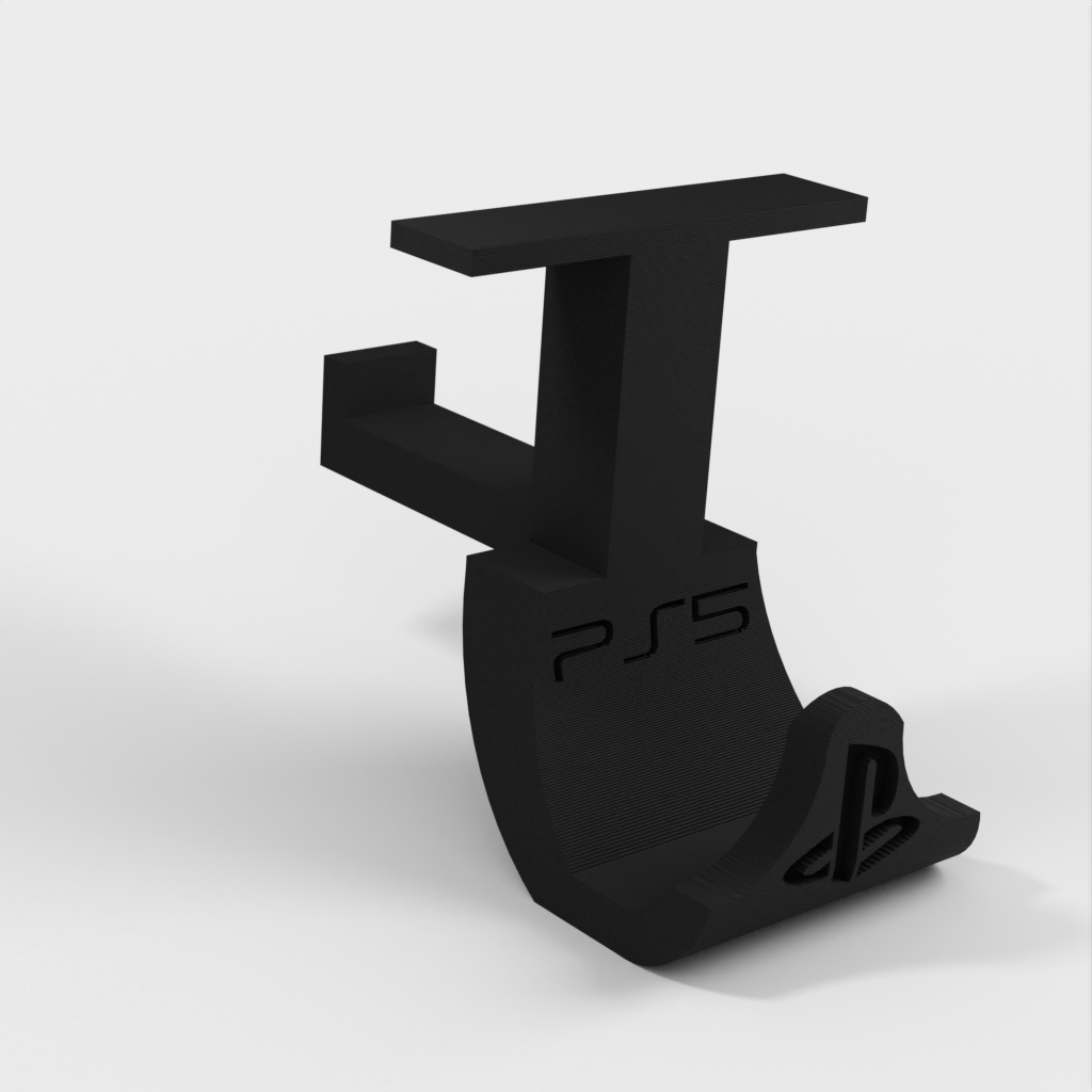 Kiinnitys pöydän alle PS5-ohjaimelle ja kuulokemikrofonille