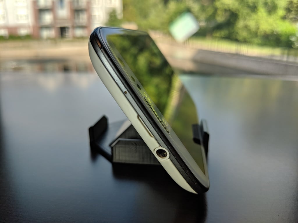 4X Phone Stand: Pieni ja kevyt älypuhelimen pidike neljällä kulmalla.