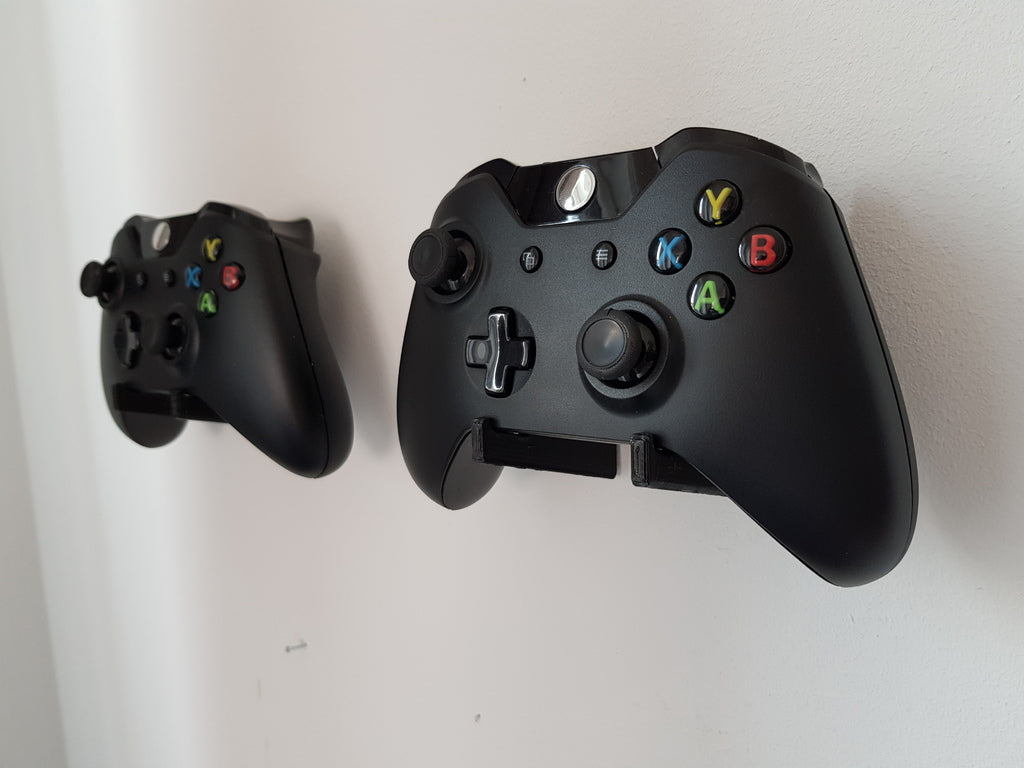 Peliohjainpidike / seinäteline Xbox 360:lle / ONE:lle ja muille
