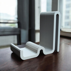 Unik slangeformet smartphoneholder til dit skrivebord