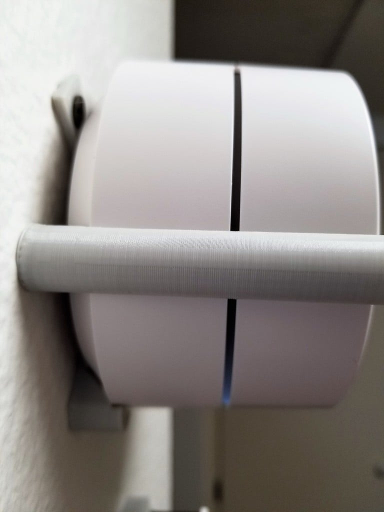 Minimalistinen seinäkiinnike Google WiFi -laitteelle
