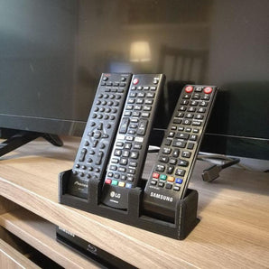 Tyylikäs ja universaali TV:n kaukosäätimen pidike