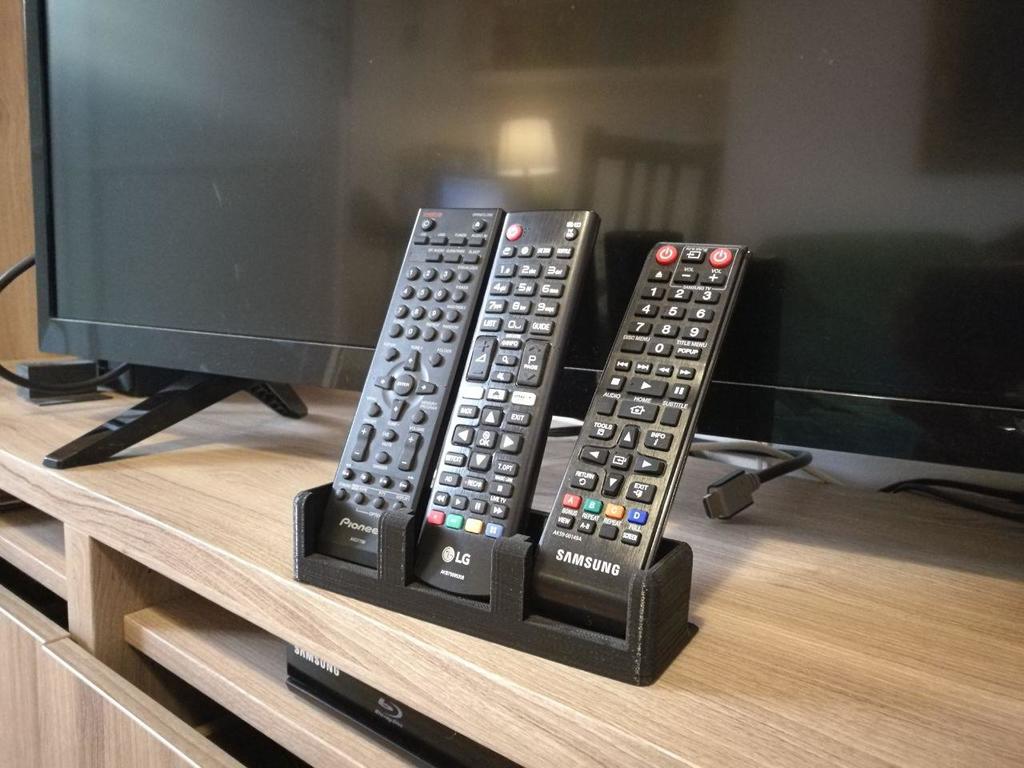 Tyylikäs ja universaali TV:n kaukosäätimen pidike