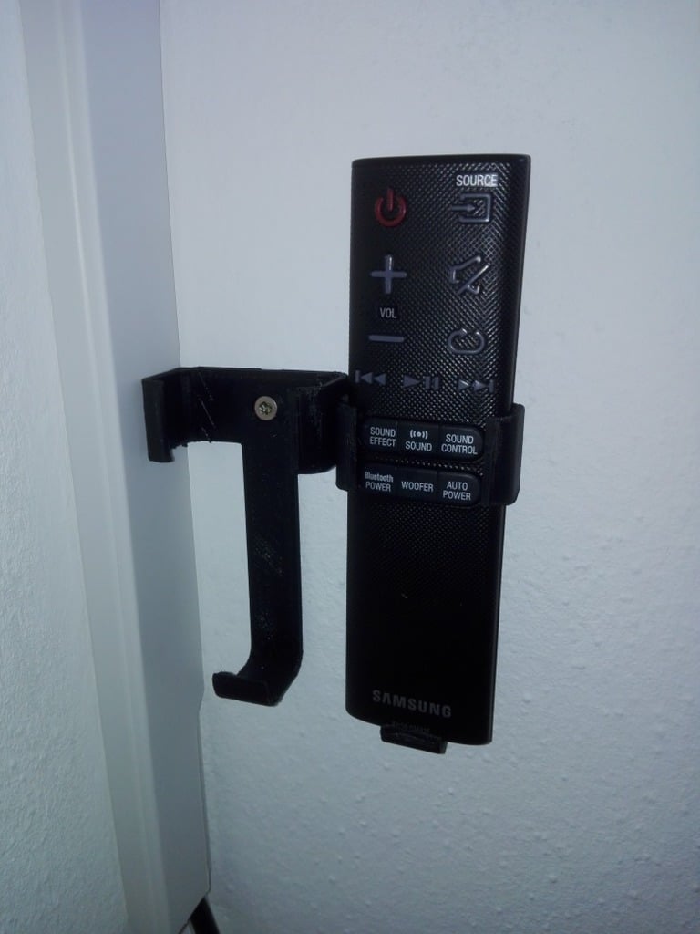 Samsung Soundbar -kaukosäätimen pidike seinäasennusta varten