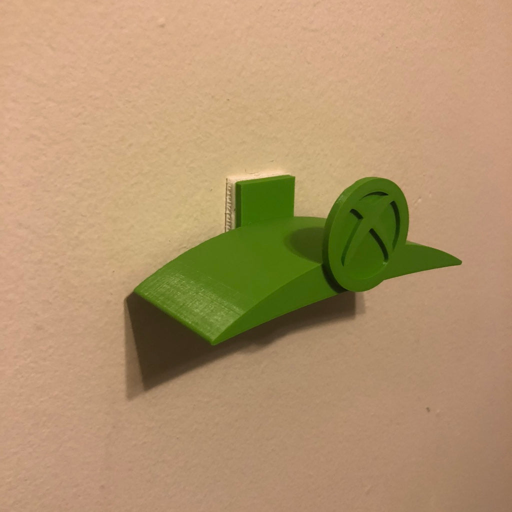 Xbox-pelikuulokkeiden seinäkiinnitys