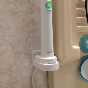 Kiinnitettävä seinäkiinnike Philips Sonicare -laturille