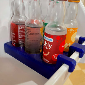 Sodastream-makupullojen pidike jääkaappiin