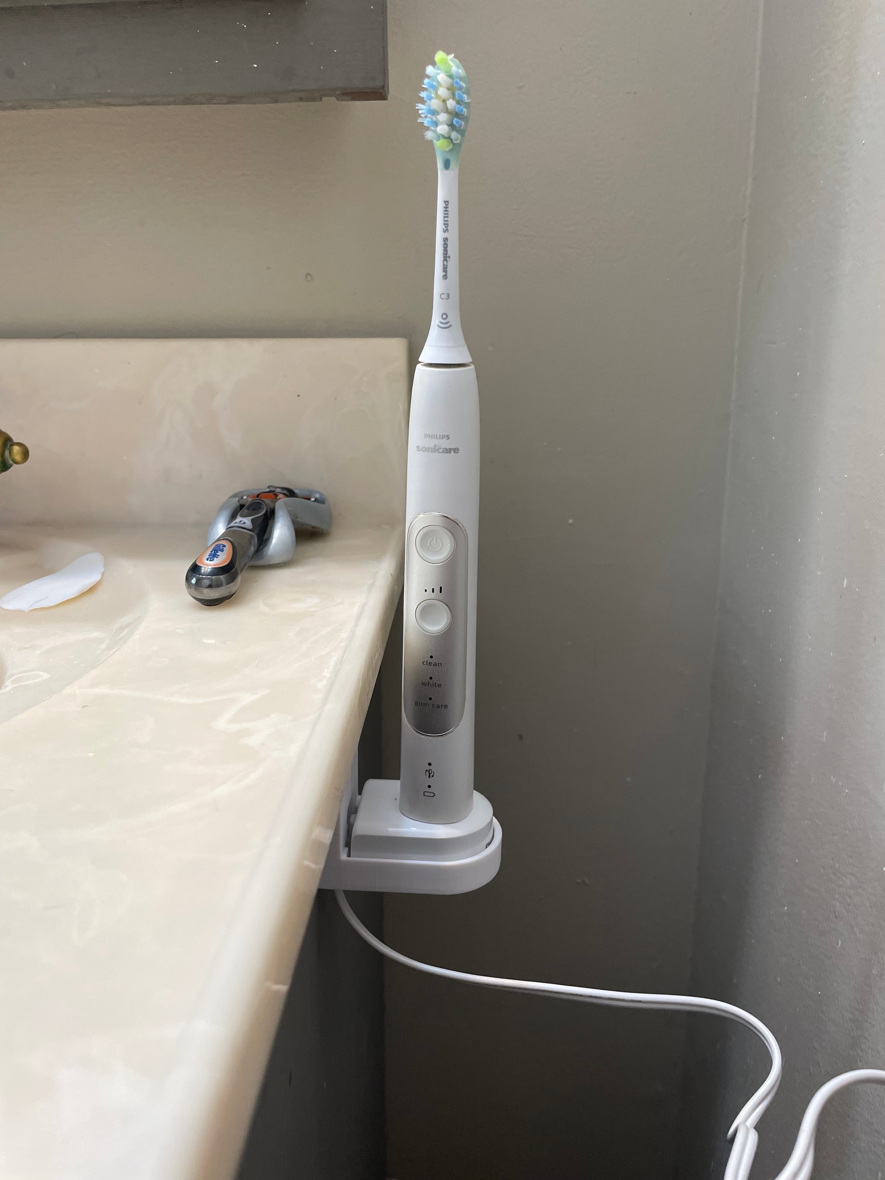 Philips Sonicare seinään asennettava laturi