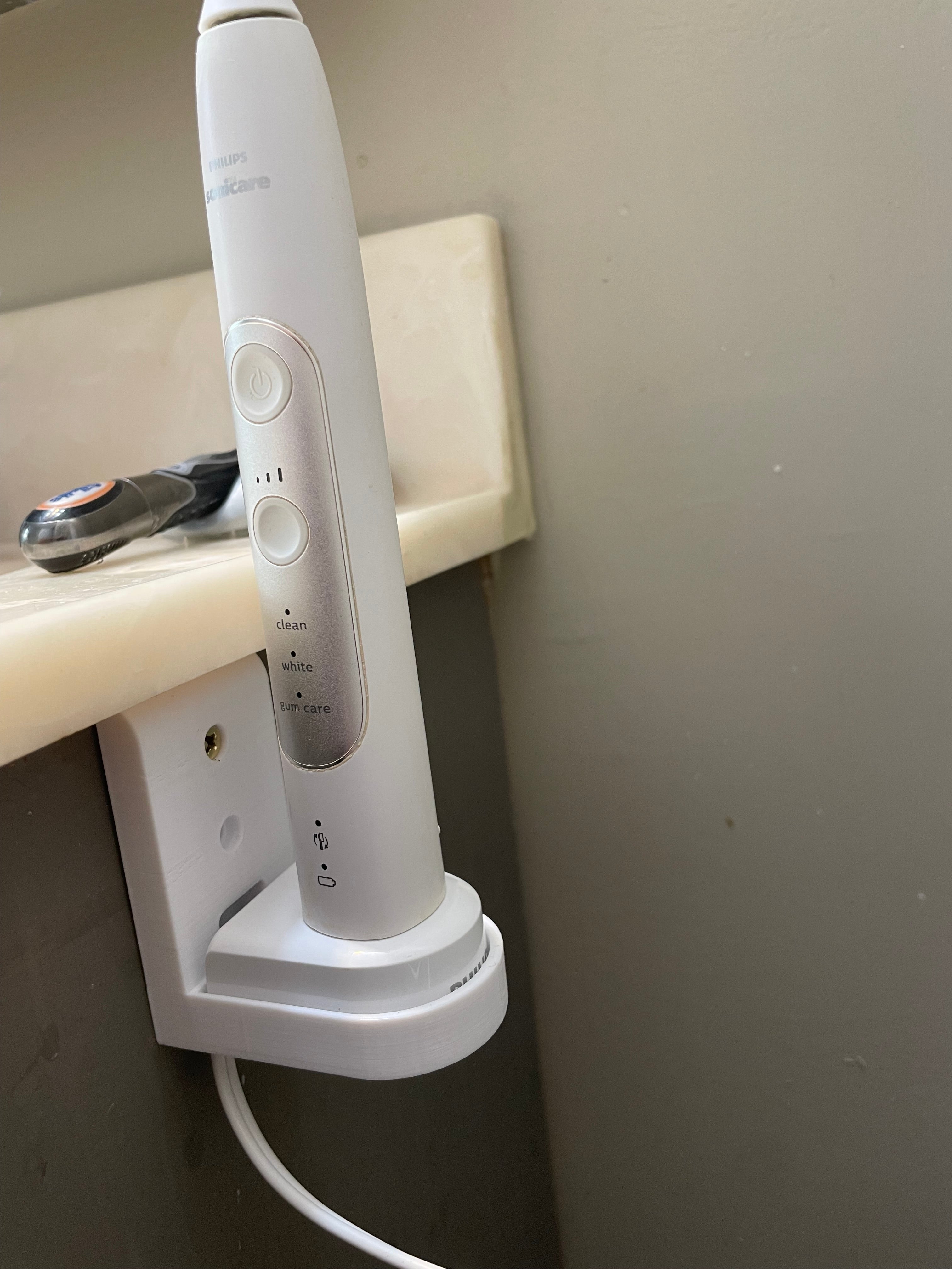 Philips Sonicare seinään asennettava laturi