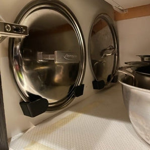 Kompakti kattilankansien oven järjestäjä