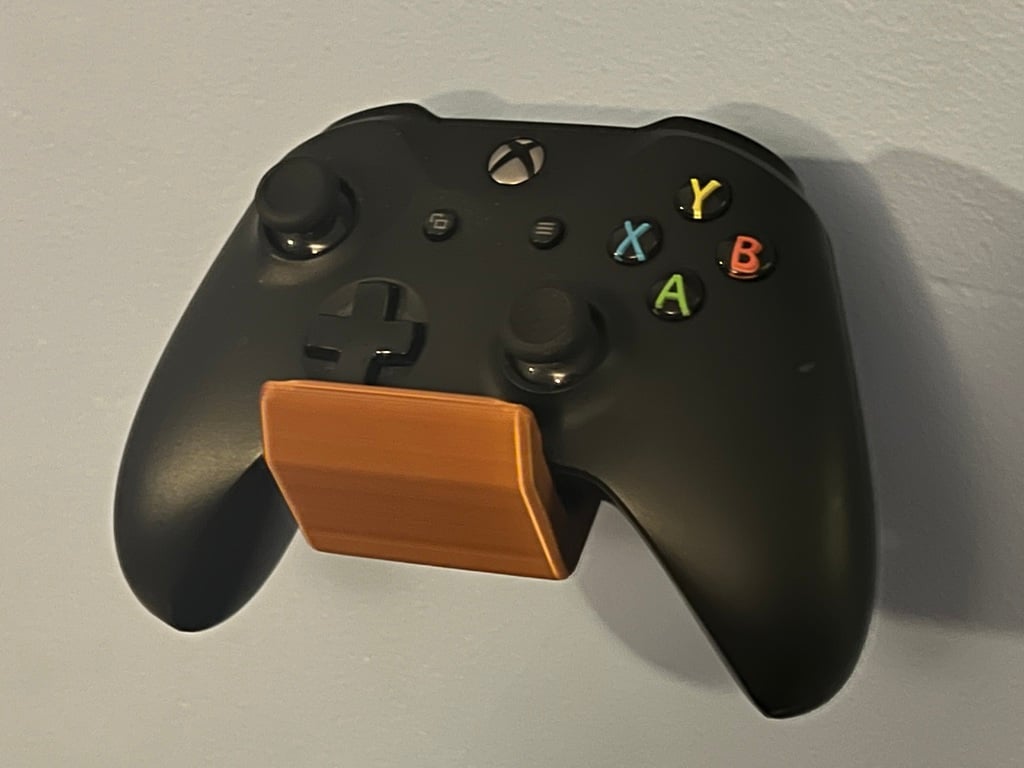 Yleiskäyttöinen ohjaimen seinäteline PlayStationille, Xboxille ja Nintendo Switch Prolle