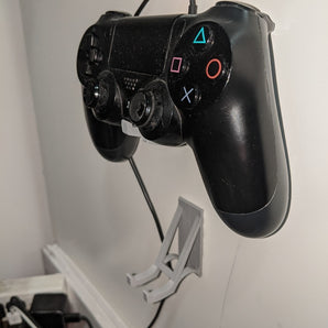 Tyylikäs seinäteline PS4-ohjaimelle