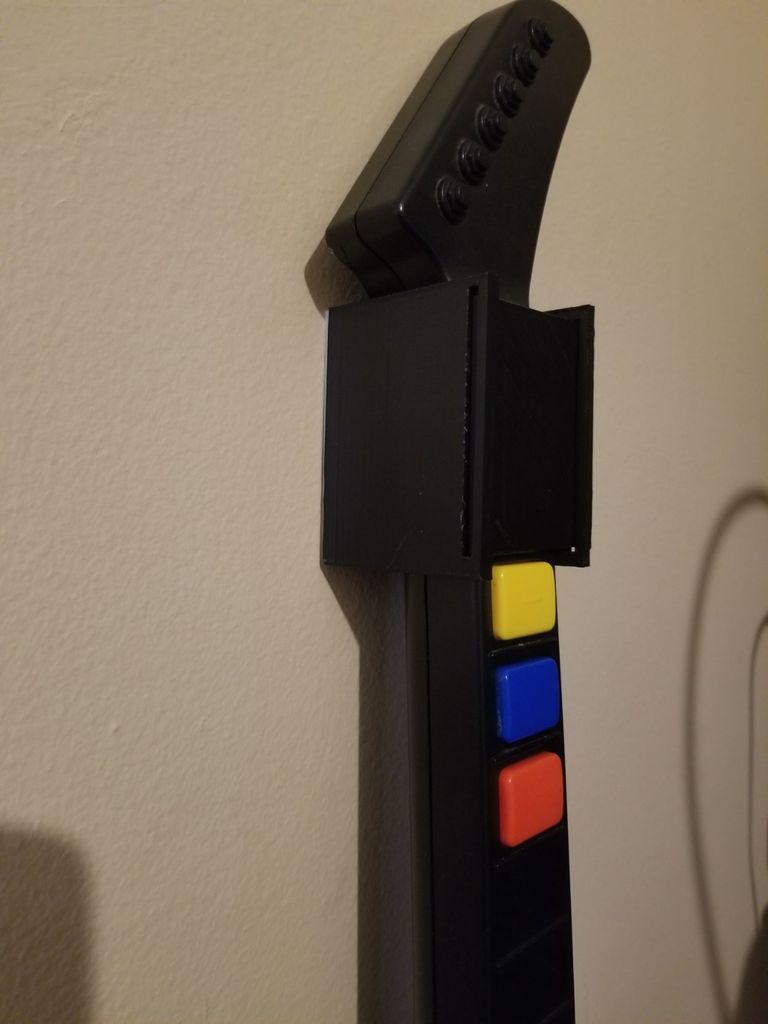 Seinäripustin Guitar Hero Xplorer V2:lle