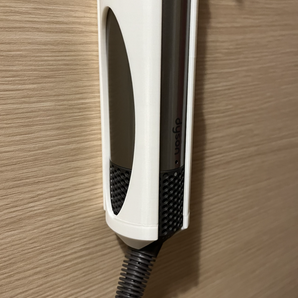 Dyson Airwrap -seinäteline