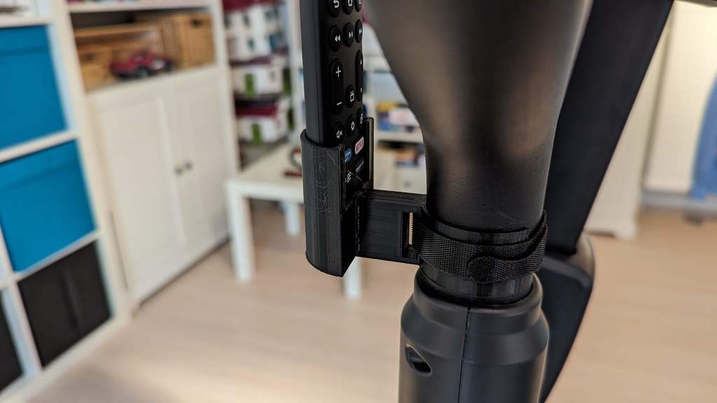 Fire TV Stick -kaukosäätimen pidike kuntopyörään turvahihnalla