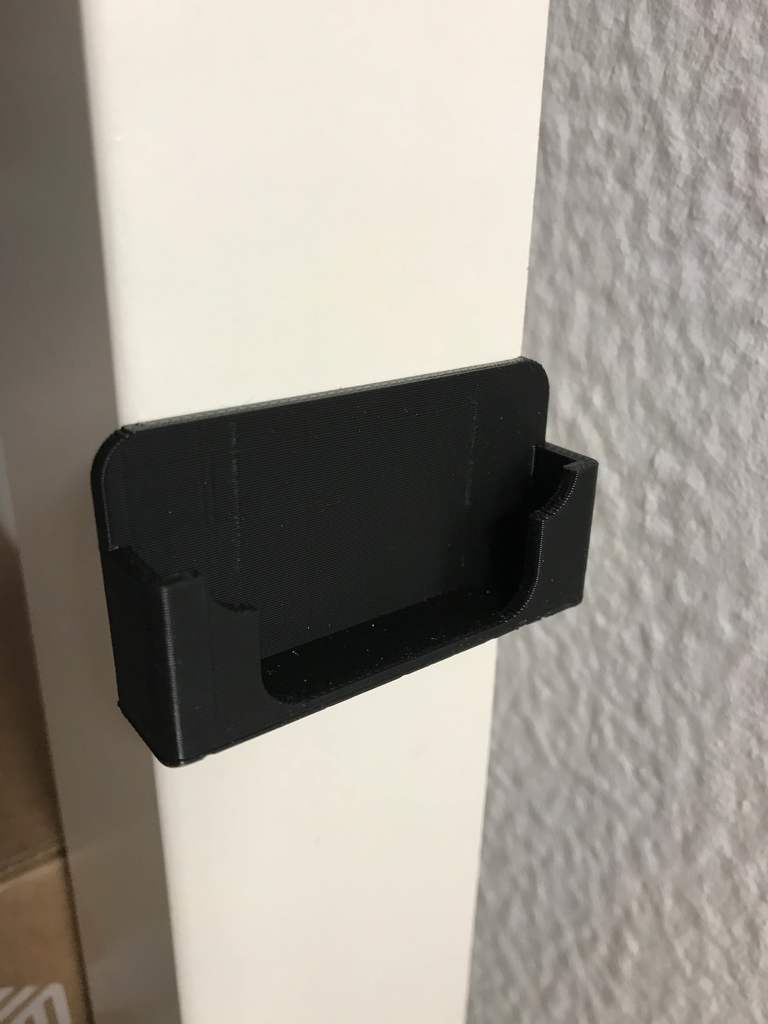 RGB LED-kaukosäätimen pidike