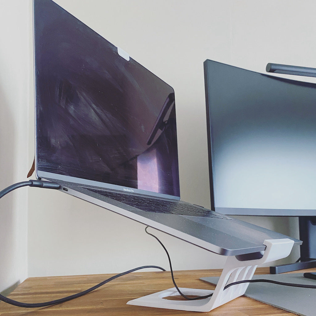 Tyylikäs kannettavan tietokoneen jalusta MacBook Prolle