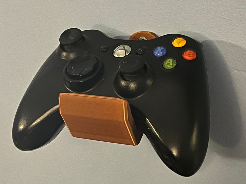 Yleiskäyttöinen ohjaimen seinäteline PlayStationille, Xboxille ja Nintendo Switch Prolle