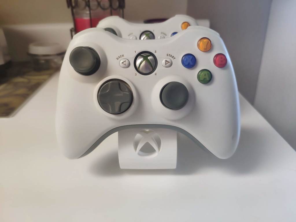 Kaksinkertainen Xbox 360 -ohjainteline logolla