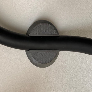 Seinään kiinnitettävä kaapeliteline sähköauton latauskaapelille (19 mm napsautusjärjestelmä)