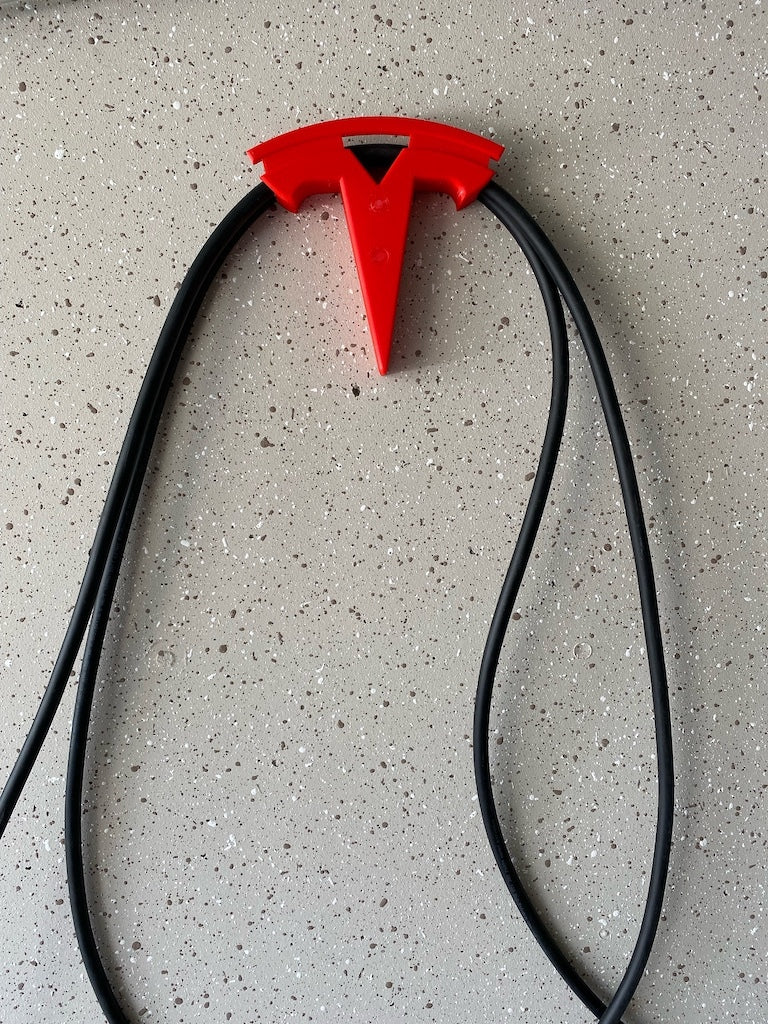 Tesla-logo Sähkökäyttöinen kaapelin pidin