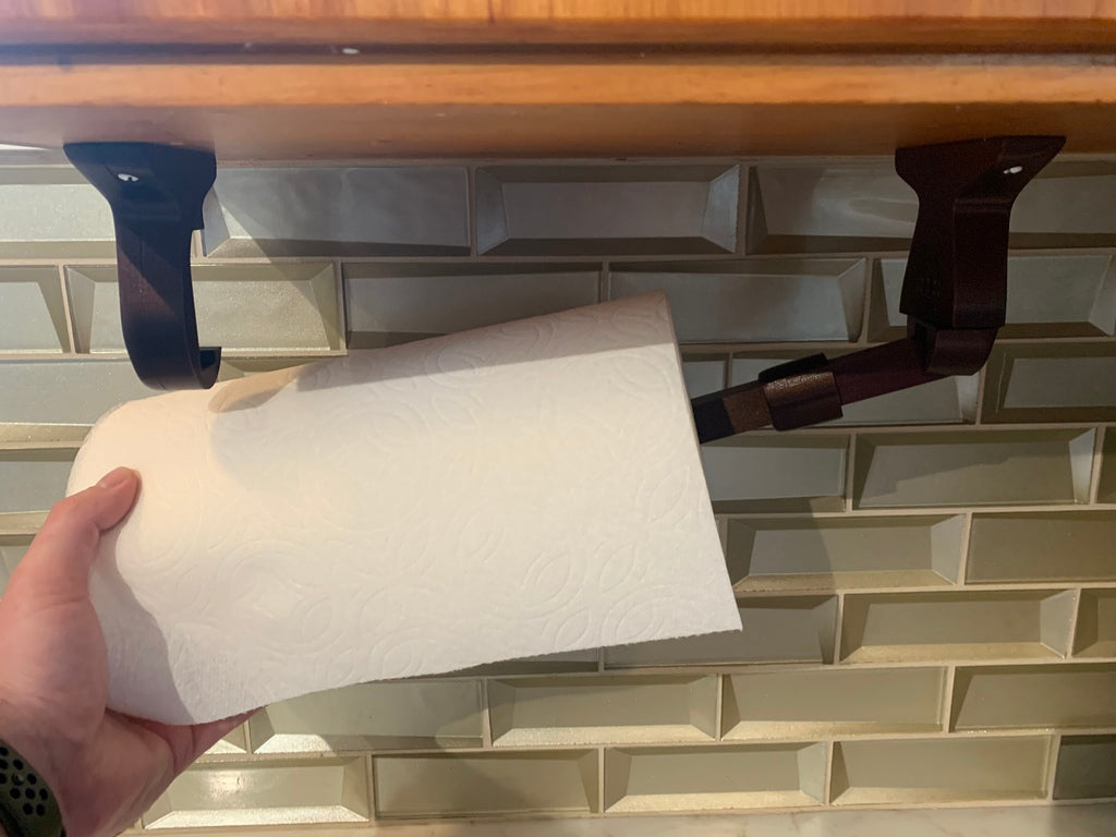 Paperipyyheteline kaapin alle kääntyvällä varrella