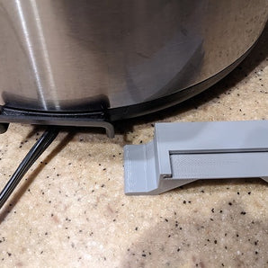 Instant Pot IP-LUX: Käytännöllinen johdonpidike järjestettyyn säilytykseen