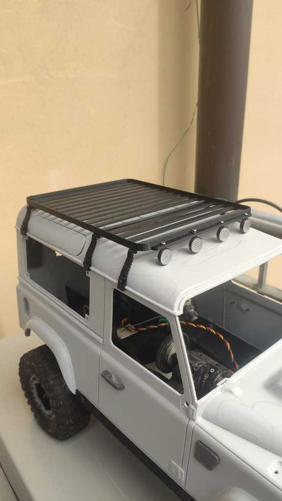 Realistiset L-kiinnikkeet RC4WD Land Rover Defender D90:n kattotelineille