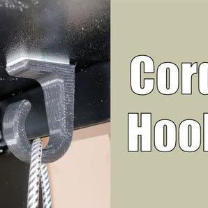 Kaapelikoukku / Käyttökiinnike - Asennetaan seinälle tai työpöydän alle